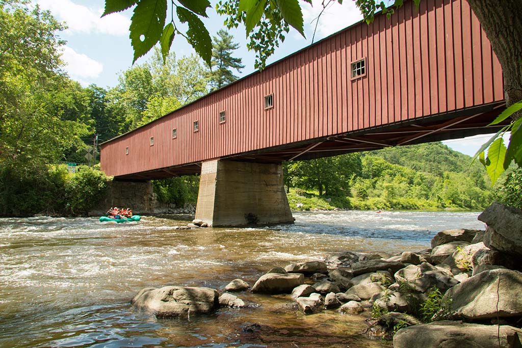 A covered bridge over a river