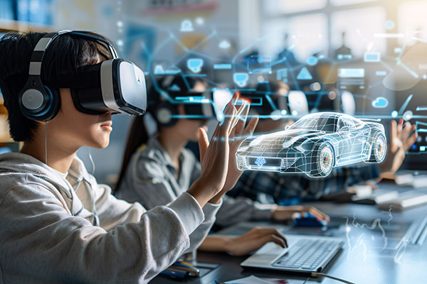 students using computers to design cars