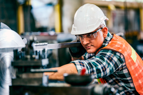 Professional man in industry technology manufacturing factory workshop.