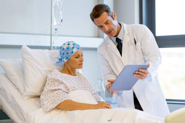Cancer patient with doctor.