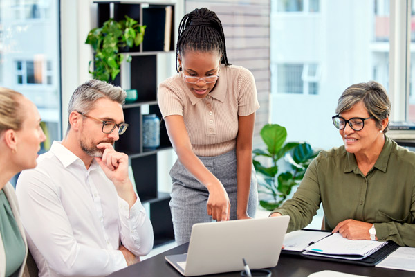 Planning, thinking and laptop of business people with manager, leader or african woman for feedback or solution.