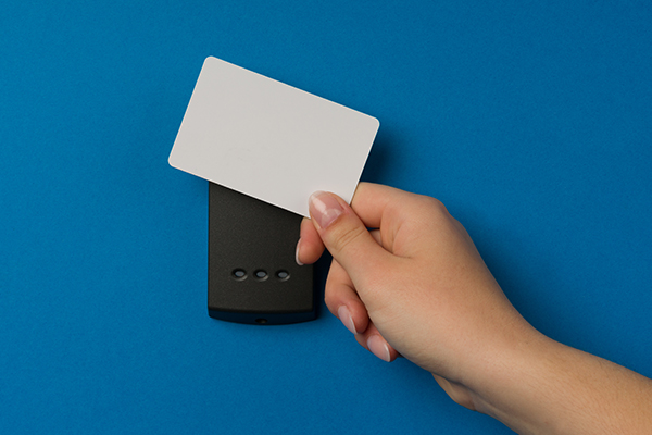 A person using access card