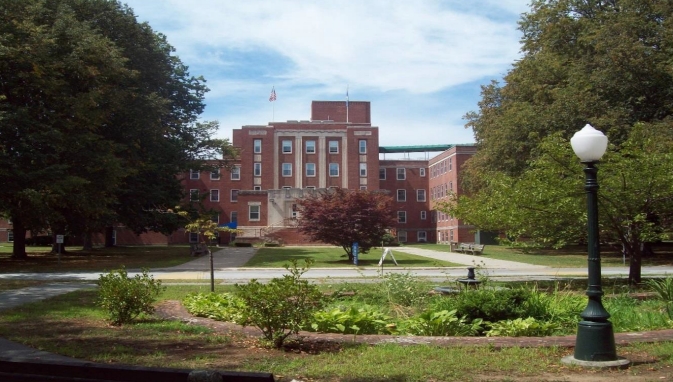 The brick facade of the Uncas on Thames campus