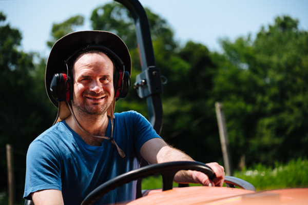 individual driving tractor