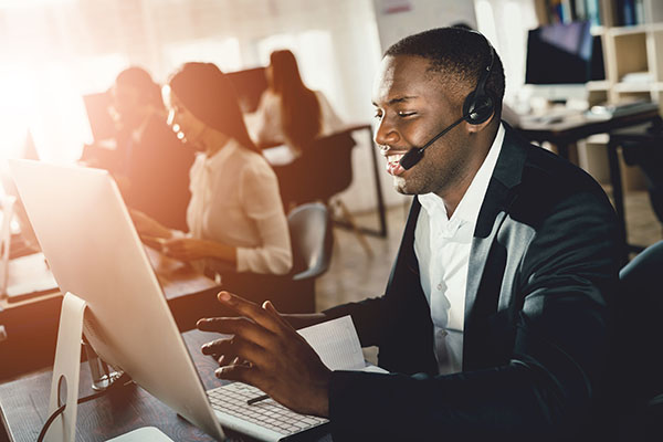 Call center workers on phones