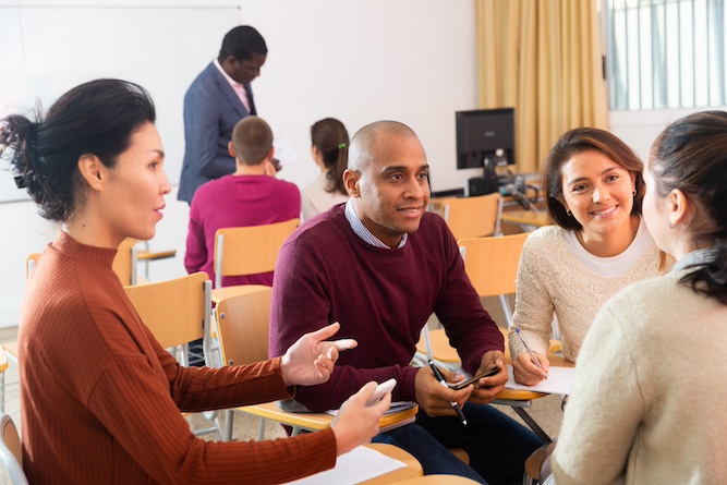 Four adults having a discussion