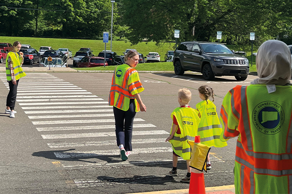 obey the orange campaign - kids crossing via a zebra crossing