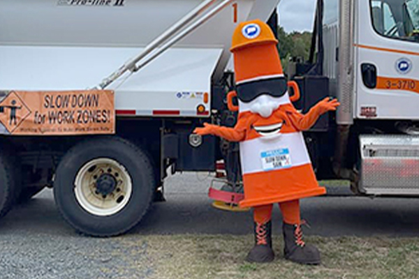 slow down sam - mascot of safety sam
