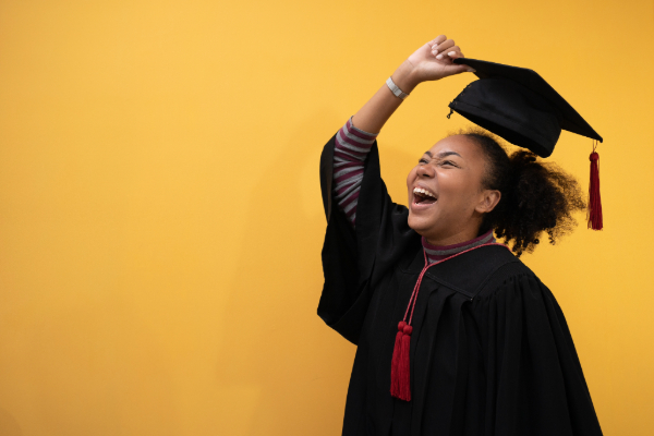 Happy woman in graduation attire