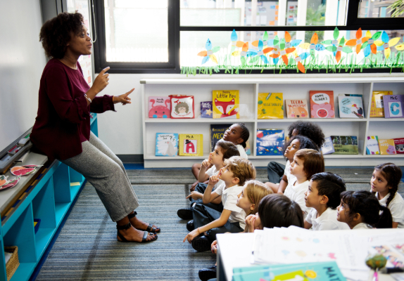 Teacher standing in front of students