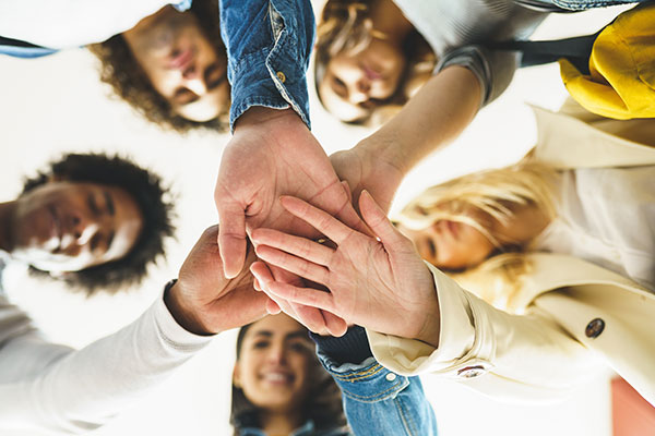 friends with hands in