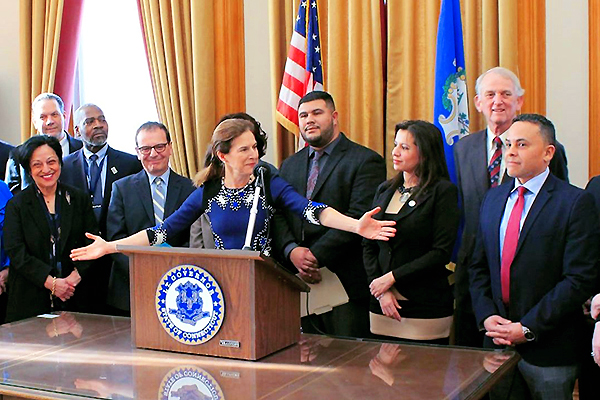 Lieutenant Governor Bysiewicz giving a Press Conference from her Office.