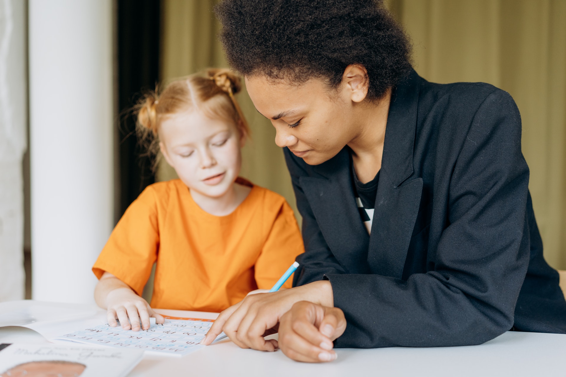 Teacher and young student